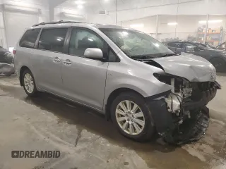 2017 Toyota Sienna XLE with VIN 5TDDZ3DC4HS166141, listed as a Copart auction lot 64357715 with 124,184 mi miles and Salvage title. Bid and sale history available at DreamBid. Image 4.