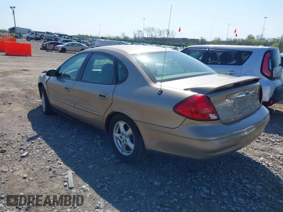 2003 Ford Taurus SE Standard with VIN 1FAFP53U73A245044, listed as a IAAI auction lot 41999582 with 85,870 mi miles. Bid and sale history available at carsss.com. Image 3.