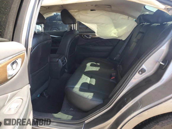 2019 Infiniti Q50 Luxe z VIN JN1EV7AP4KM514928, wystawiony jako Copart lot #56694755 z przebiegiem 63 705 mil mil oraz Szkoda całkowita • Salvage title. Historia ofert i sprzedaży dostępna na DreamBid. Obrazek 10.