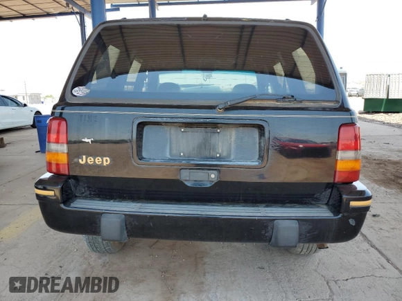 1994 Jeep Grand Cherokee Limited with VIN 1J4GZ78S5RC304501, listed as a Copart auction lot 64632335 with 184,333 mi miles and Salvage title. Bid and sale history available at DreamBid. Image 6.
