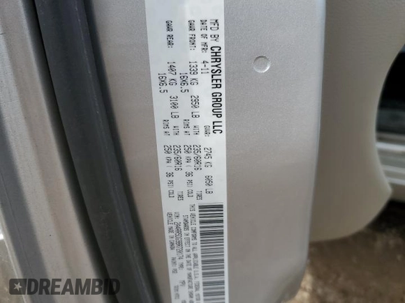 2011 Chrysler Town & Country Touring z VIN 2A4RR5DG9BR720174, wystawiony jako Copart lot #54435885 z przebiegiem 168 089 mil mil oraz Szkoda całkowita • Salvage title. Historia ofert i sprzedaży dostępna na DreamBid. Obrazek 13.