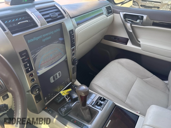2014 Lexus GX with VIN JTJBM7FX1E5090308, listed as a IAAI auction lot 42130546 with 132,247 mi miles. Bid and sale history available at carsss.com. Image 6.