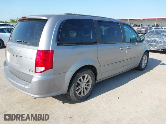 2014 Dodge Grand Caravan SXT z VIN 2C4RDGCG4ER244762, wystawiony jako IAAI lot #42002269 z przebiegiem 117 896 mil mil oraz . Historia ofert i sprzedaży dostępna na DreamBid. Obrazek 4.