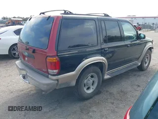 2000 Ford Explorer Eddie Bauer z VIN 1FMZU64EXYZA74923, wystawiony jako IAAI lot #41504088 z przebiegiem 254 021 mil mil oraz . Historia ofert i sprzedaży dostępna na DreamBid. Obrazek 4.