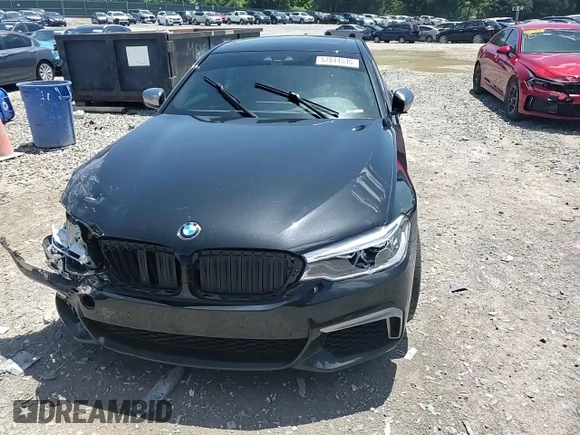2019 BMW 5 Series M550i xDrive with VIN WBAJB9C53KB289356, listed as a Copart auction lot 57814535 with 60,454 mi miles and Clean title. Bid and sale history available at DreamBid. Image 14.