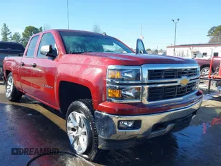 2014 Chevrolet Silverado 1500 LT with VIN 1GCVKREC7EZ203414, listed as a IAAI auction lot 41447007 with 129,537 mi miles. Bid and sale history available at carsss.com. Image 1.