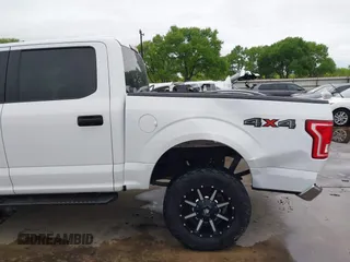 2015 Ford F-150 XLT with VIN 1FTEW1EP7FKE61564, listed as a IAAI auction lot 41889545 with 152,057 mi miles. Bid and sale history available at carsss.com. Image 19.
