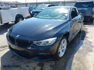 2015 BMW 4 Series 428i xDrive with VIN WBA3N5C50FK197765, listed as a IAAI auction lot 41730316 with 92,958 mi miles. Bid and sale history available at carsss.com. Image 2.