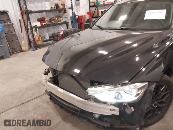 2018 BMW 3 Series 320i xDrive with VIN WBA8E5G5XJNU46855, listed as a IAAI auction lot 41526290 with 68,720 mi miles. Bid and sale history available at carsss.com. Image 6.