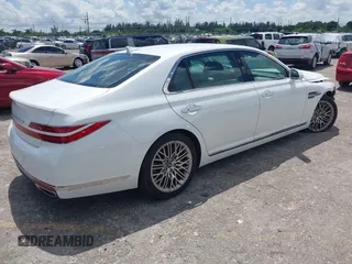 2022 Genesis G90 3.3T Premium with VIN KMTF34PA6NU092904, listed as a IAAI auction lot 40290615 with 10,370 mi miles. Bid and sale history available at carsss.com. Image 4.