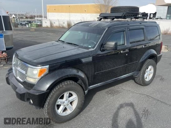 2008 Dodge Nitro SLT z VIN 1D8GU58K68W145253, wystawiony jako Copart lot #43768705 z przebiegiem 167 904 mil mil oraz Czysty tytuł • Clean title. Historia ofert i sprzedaży dostępna na DreamBid. Obrazek 2.
