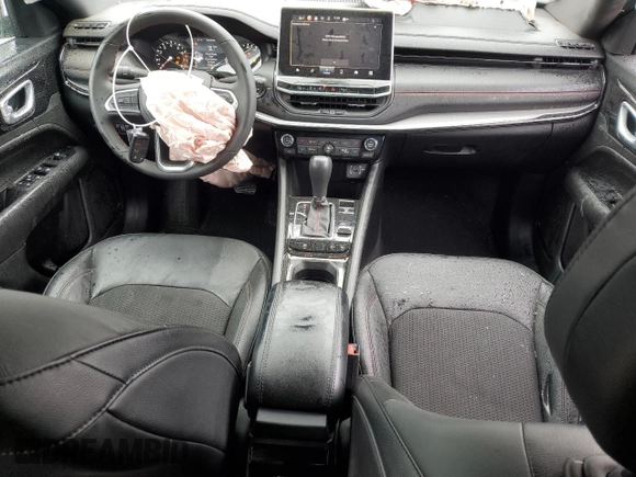 2024 Jeep Compass Trailhawk with VIN 3C4NJDDN6RT104623, listed as a Copart auction lot 57217045 with 15,306 mi miles and Salvage title. Bid and sale history available at DreamBid. Image 8.