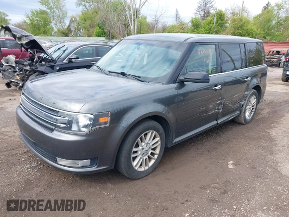 2016 Ford Flex SEL z VIN 2FMGK5C82GBA21945, wystawiony jako IAAI lot #42206498 z przebiegiem 141 320 mil mil oraz . Historia ofert i sprzedaży dostępna na DreamBid. Obrazek 2.