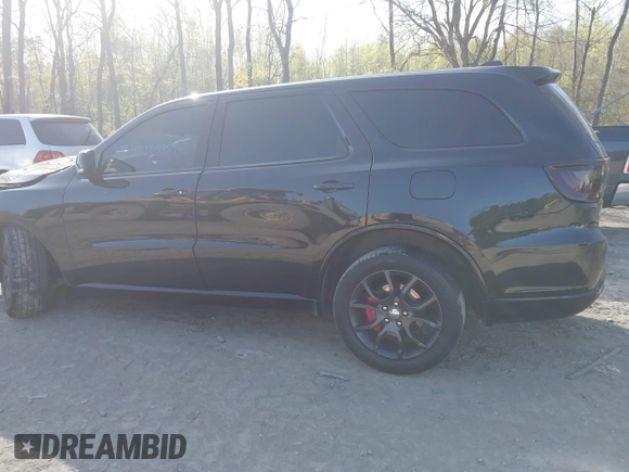 2016 Dodge Durango R/T with VIN 1C4SDJCT7GC460564, listed as a IAAI auction lot 42129759 with 134,085 mi miles and . Bid and sale history available at DreamBid. Image 14.