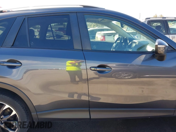 2016 Mazda CX-5 Grand Touring with VIN JM3KE2DY9G0824196, listed as a IAAI auction lot 41801887 with 88,625 mi miles. Bid and sale history available at carsss.com. Image 14.