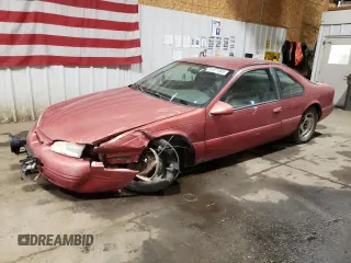 1996 Ford Thunderbird LX с VIN 1FALP62W0TH160002, выставлен на аукционе Copart как лот 61871365 с пробегом 214 512 миль миль и Списание • Salvage title. История ставок и продаж доступна на DreamBid. Изображение 1.