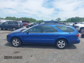 2003 Ford Taurus SE Standard z VIN 1FAFP58U93A171652, wystawiony jako IAAI lot #42314064 z przebiegiem 116 697 mil mil oraz . Historia ofert i sprzedaży dostępna na DreamBid. Obrazek 14.