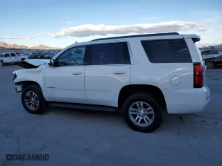 2019 Chevrolet Tahoe LT with VIN 1GNSKBKC0KR123602, listed as a Copart auction lot 48408875 with 77,652 mi miles and Salvage Title. Bid and sale history available at carsss.com. Image 2.