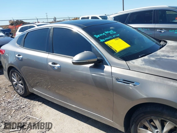 2016 Kia Optima EX with VIN 5XXGU4L31GG106854, listed as a IAAI auction lot 41762052 with 122,121 mi miles. Bid and sale history available at carsss.com. Image 13.