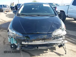 2020 Toyota Prius L Eco z VIN JTDKARFU6L3104385, wystawiony jako IAAI lot #41922029 z przebiegiem 123 235 mil mil oraz . Historia ofert i sprzedaży dostępna na DreamBid. Obrazek 12.