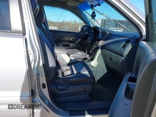 2006 Honda Pilot EX-L with VIN 5FNYF18786B030253, listed as a IAAI auction lot 41708620 with 146,713 mi miles and . Bid and sale history available at DreamBid. Image 5.