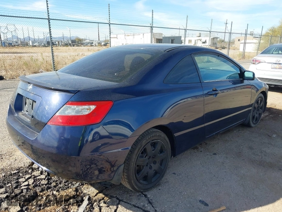 2009 Honda Civic Cpe LX with VIN 2HGFG12679H508263, listed as a IAAI auction lot 41498344 with 128,876 mi miles. Bid and sale history available at carsss.com. Image 4.