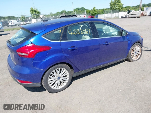 2015 Ford Focus Titanium z VIN 1FADP3N25FL291844, wystawiony jako IAAI lot #42383067 z przebiegiem 82 545 mil mil oraz . Historia ofert i sprzedaży dostępna na DreamBid. Obrazek 4.