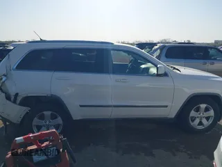 2011 Jeep Grand Cherokee Laredo with VIN 1J4RR4GG4BC703071, listed as a IAAI auction lot 41992878 with 126,199 mi miles and . Bid and sale history available at DreamBid. Image 13.