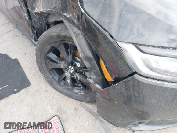 2024 Honda Odyssey Sport with VIN 5FNRL6H75RB056176, listed as a IAAI auction lot 41701547 with 10,660 mi miles and . Bid and sale history available at DreamBid. Image 6.