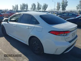 2020 Toyota Corolla LE with VIN 5YFEPRAEXLP062290, listed as a IAAI auction lot 41858318 with 80,692 mi miles. Bid and sale history available at carsss.com. Image 3.