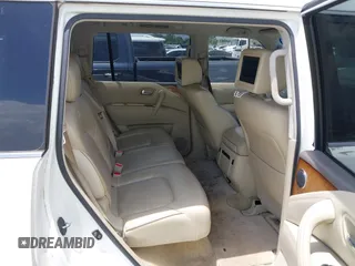 2012 Infiniti QX56 8-passenger with VIN JN8AZ2ND4C9716728, listed as a IAAI auction lot 42501339 with 216,302 mi miles and . Bid and sale history available at DreamBid. Image 8.