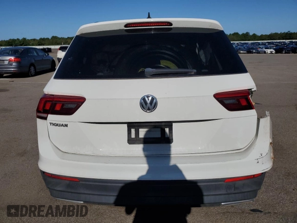 2020 Volkswagen Tiguan S with VIN 3VV1B7AX0LM037667, listed as a Copart auction lot 61649485 with 71,557 mi miles and Salvage title. Bid and sale history available at DreamBid. Image 6.