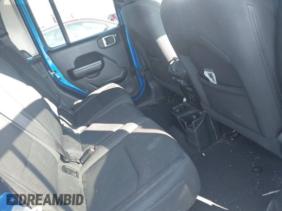 2021 Jeep Gladiator Willys with VIN 1C6HJTAG3ML572690, listed as a IAAI auction lot 41649907 with 74,734 mi miles and . Bid and sale history available at DreamBid. Image 8.
