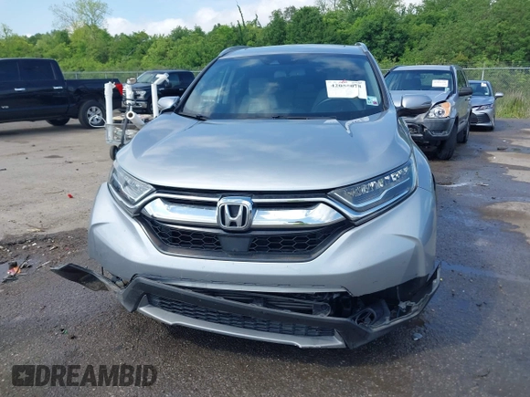 2018 Honda CR-V Touring with VIN 7FARW1H90JE012526, listed as a IAAI auction lot 42055078 with 96,098 mi miles and . Bid and sale history available at DreamBid. Image 12.