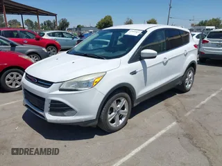 2014 Ford Escape SE with VIN 1FMCU9G98EUA39702, listed as a IAAI auction lot 42683914 with 276,162 mi miles and . Bid and sale history available at DreamBid. Image 2.