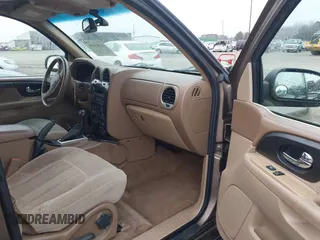2003 GMC Envoy SLE with VIN 1GKDT13S332264984, listed as a IAAI auction lot 41523191 with 227,004 mi miles. Bid and sale history available at carsss.com. Image 5.