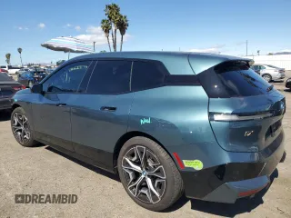 2023 BMW iX M60 with VIN WB533CF01PCM82043, listed as a Copart auction lot 47447815 with 9,058 mi miles and Salvage Title. Bid and sale history available at carsss.com. Image 2.