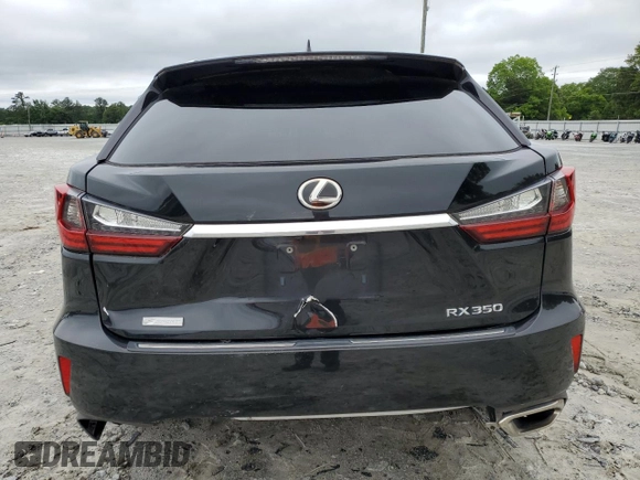 2016 Lexus RX 350 with VIN 2T2BZMCA9GC039515, listed as a Copart auction lot 58614395 with 144,614 mi miles and Salvage title. Bid and sale history available at DreamBid. Image 6.