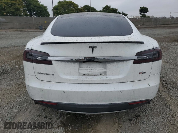 2014 Tesla Model S 60 с VIN 5YJSA1H19EFP52457, выставлен на аукционе Copart как лот 59589905 с пробегом 167 662 миль миль и Списание • Salvage title. История ставок и продаж доступна на DreamBid. Изображение 6.