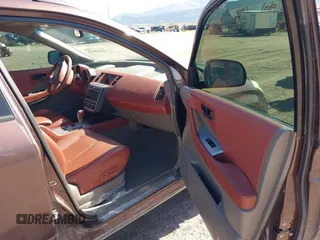 2003 Nissan Murano SL with VIN JN8AZ08W03W218075, listed as a IAAI auction lot 42158632 with 127,762 mi miles and . Bid and sale history available at DreamBid. Image 5.