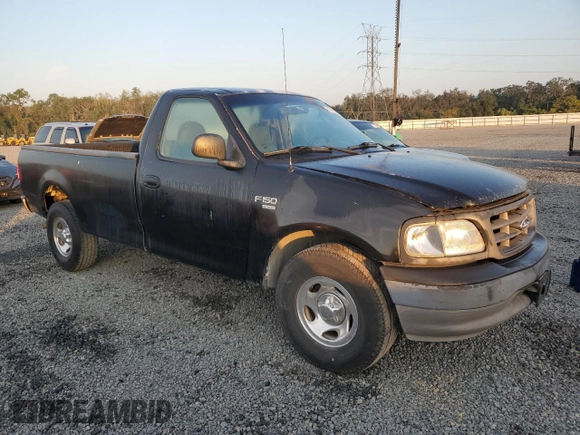 2003 Ford F-150 XL with VIN 1FTRF17W13NA97772, listed as a Copart auction lot 77692074 with Not Provided miles and Salvage Title. Bid and sale history available at DreamBid. Image 4.