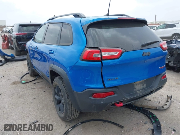 2018 Jeep Cherokee Trailhawk with VIN 1C4PJMBX6JD569684, listed as a IAAI auction lot 41925325 with 149,446 mi miles and . Bid and sale history available at DreamBid. Image 3.