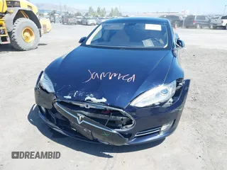 2014 Tesla Model S 60 with VIN 5YJSA1H12EFP46760, listed as a IAAI auction lot 42344596 with 106,252 mi miles and . Bid and sale history available at DreamBid. Image 6.