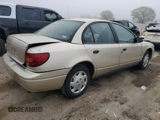 2002 Saturn SL z VIN 1G8ZH52892Z100073, wystawiony jako Copart lot #57023065 z przebiegiem 160 442 mil mil oraz Nie do naprawy. Historia ofert i sprzedaży dostępna na DreamBid. Obrazek 3.