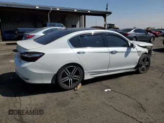 2017 Honda Accord Touring with VIN 1HGCR3F98HA021731, listed as a Copart auction lot 53645455 with 130,907 mi miles and Salvage title. Bid and sale history available at DreamBid. Image 3.