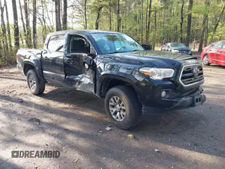 2019 Toyota Tacoma SR z VIN 3TMCZ5AN5KM221720, wystawiony jako IAAI lot #41967986 z przebiegiem 83 701 mil mil oraz . Historia ofert i sprzedaży dostępna na DreamBid. Obrazek 1.