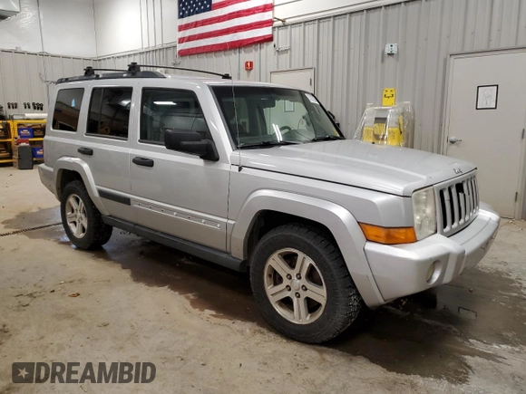 2006 Jeep Commander with VIN 1J8HG48N86C275203, listed as a Copart auction lot 57827085 with 197,552 mi miles and Clean title. Bid and sale history available at DreamBid. Image 4.