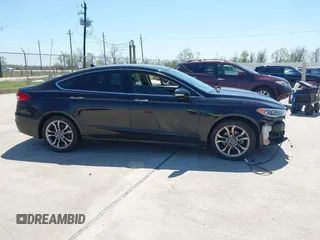 2019 Ford Fusion SEL with VIN 3FA6P0CD2KR113476, listed as a IAAI auction lot 41868614 with 86,650 mi miles. Bid and sale history available at carsss.com. Image 13.