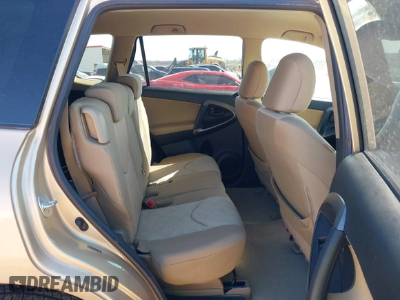 2009 Toyota RAV4 with VIN JTMZF33V995000660, listed as a IAAI auction lot 41633209 with 106,959 mi miles. Bid and sale history available at carsss.com. Image 8.