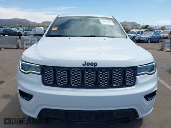 2021 Jeep Grand Cherokee Laredo E with VIN 1C4RJEAG2MC785168, listed as a IAAI auction lot 42115460 with 64,036 mi miles and . Bid and sale history available at DreamBid. Image 13.